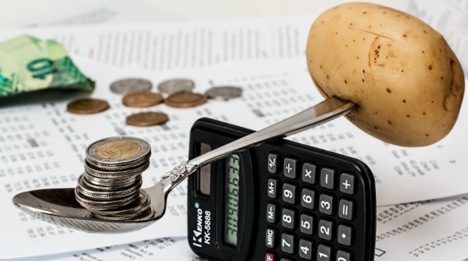 balancing money and potato